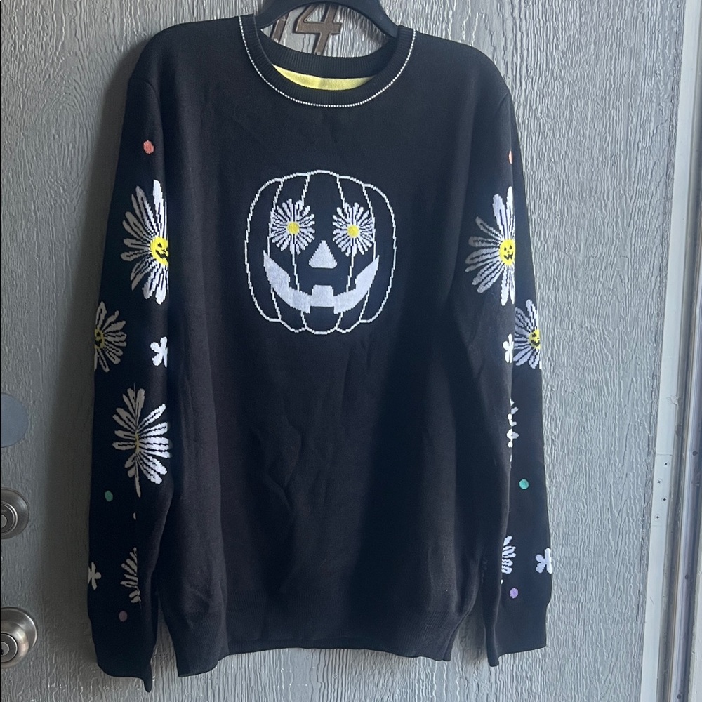 Black Crewneck Sweater with Floral and Pumpkin Design